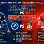 Nhận định trận đấu Millwall vs Wrexham vòng 4 Championship 2026/27. Cuộc đối đầu hấp dẫn giữa tiền đạo Joshua Coburn (Millwall) và trung vệ Callum Doyle (Wrexham) tại sân The Den.